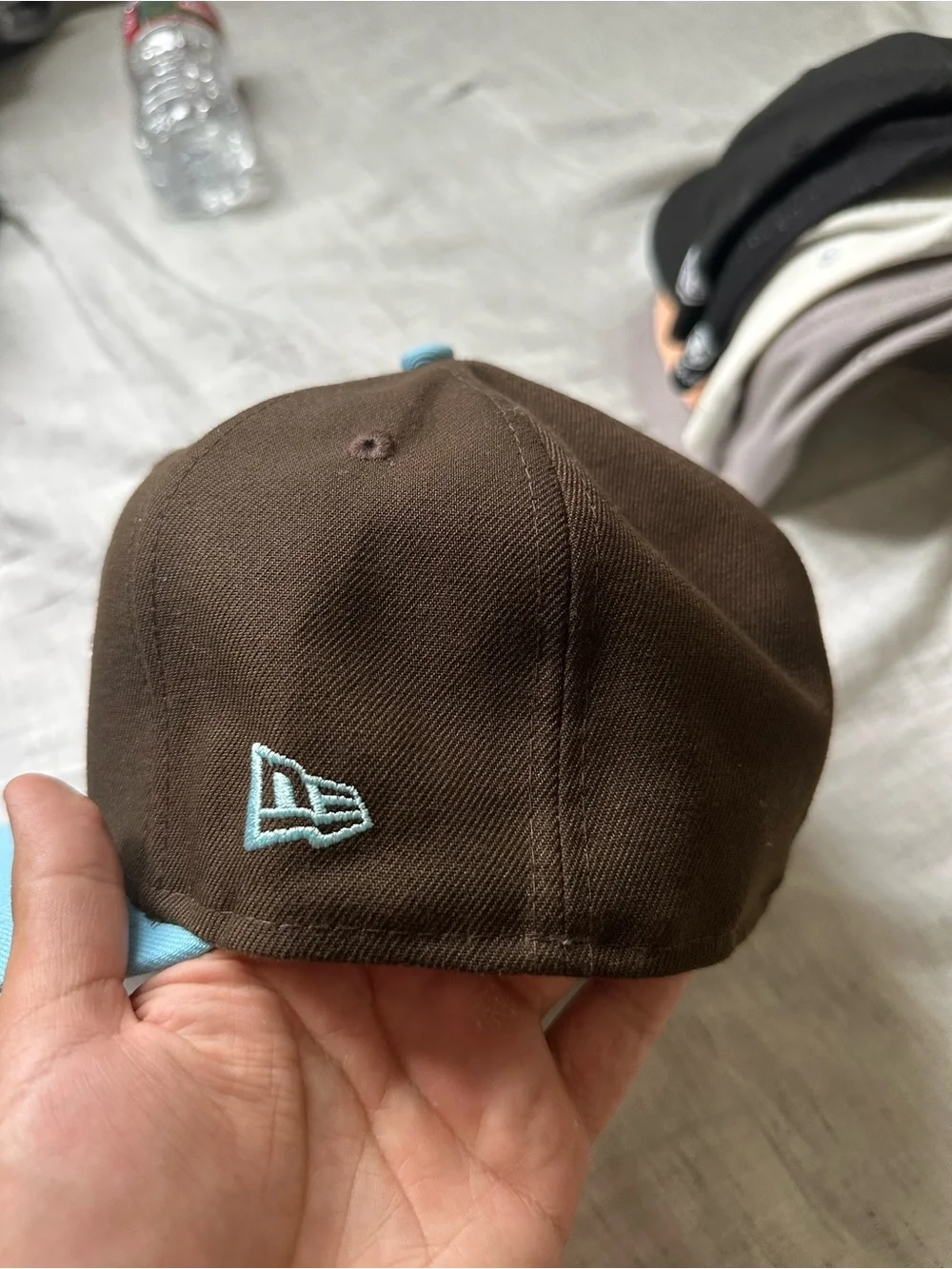 New Era Brown Snapback Hat with Light Blue Brim and Embroidered Elephant